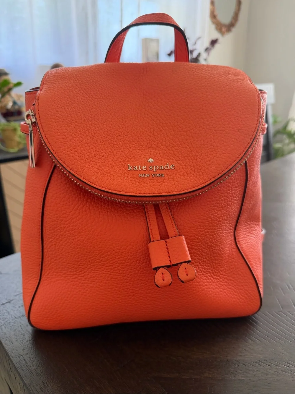 kate spade orange pebbled leather backpack with flap
